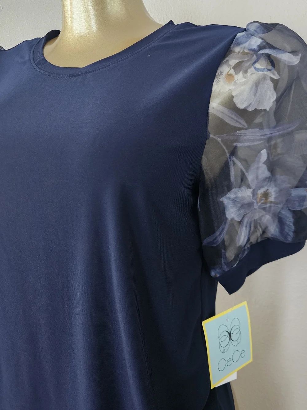 CeCe Navy Top with Sheer Floral Puff Sleeves